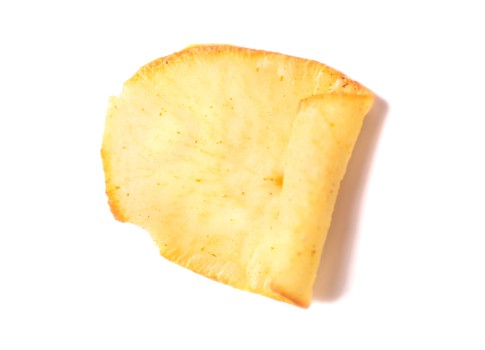 Single yellow chip on white background