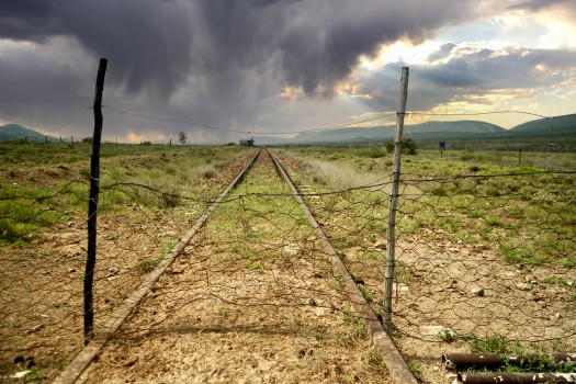 Old railway line in desolate landscape