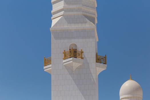 Mosque's golden triangular balconies