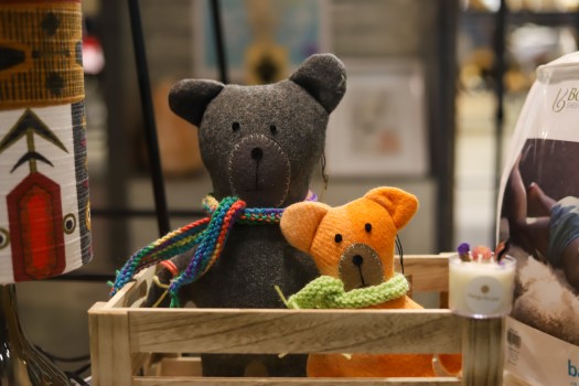 Stuffed toy bears in a wooden box