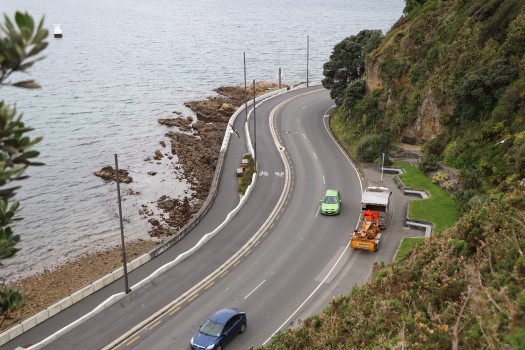 Cars travelling on coastal road