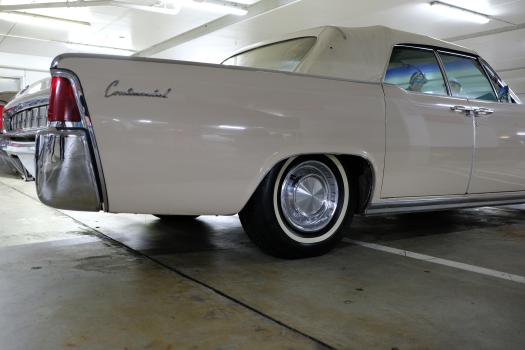 Classic white Lincoln Continental emblem rear fender and wheel