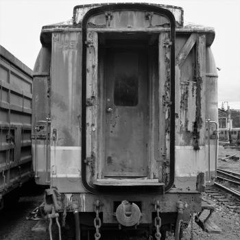 Back of an abandoned train bogie monochrome