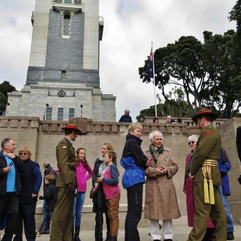 Families with Military personnel and hoisted flag of New Zealand