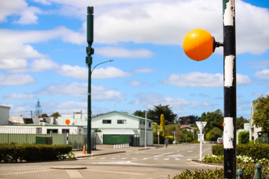 Orange ball shaped light cover on pole