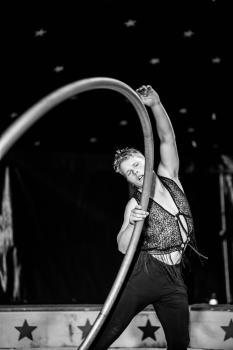 Circus acrobat with ring black and white