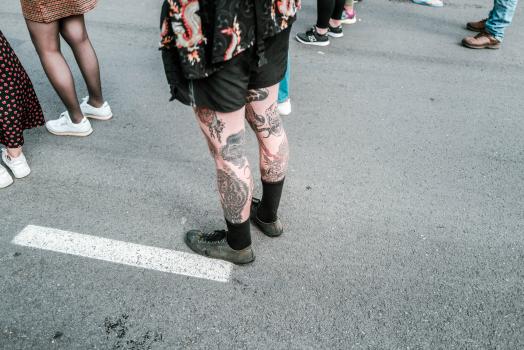 Tattooed legs at Newtown festival 2021