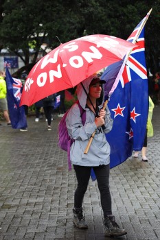 Umbrella and NZ flag - Convoy 2022 protest