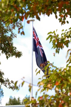 Hoisted national ensign of NZ, ANZAC 2022