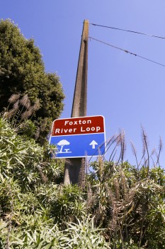 Foxton river loop sign on a concrete barrier