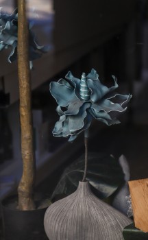Blue artificial flower