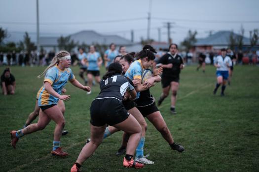 Women's rugby tackle