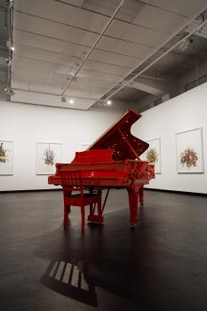 The red piano and its red piano chair