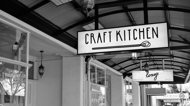 Craft Kitchen shop sign on K' road black and white