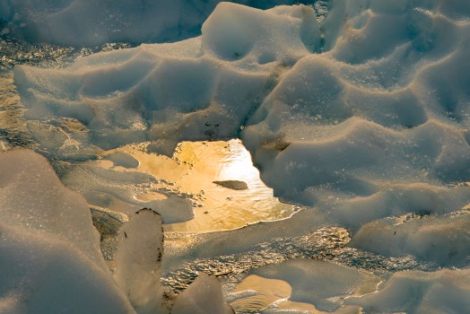 Fox Glacier warm sunlight reflections