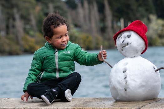 Snowman and little boy
