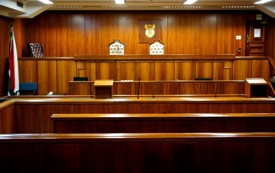 Interior of a courtroom, wood panelled