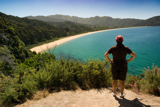 Kiwi woman views Totaranui, Abel Tasman
