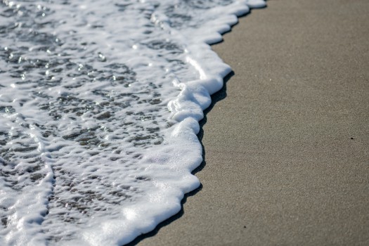Foam on the sand