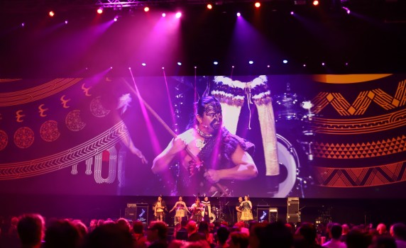 Māori toa toa performing on stage
