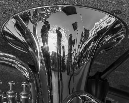 Reflections of crowd in musical instrument