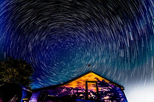 Star trail over the old barn