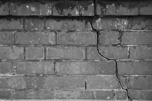 Crack in a brick wall B&W