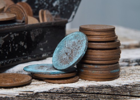 Old coins and tin