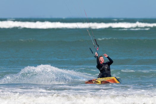 Kite surfer and spray