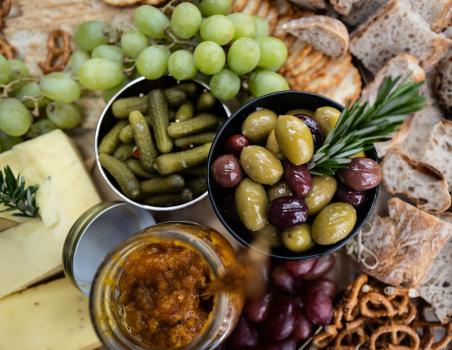 Platter with olives, bread, grapes etc