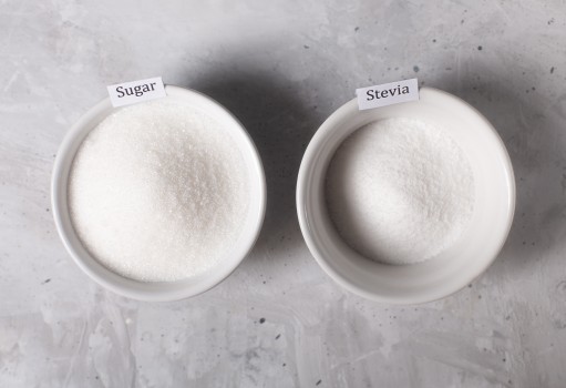 Sugar and stevia in white bowls