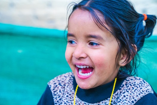 Giggling little girl, India