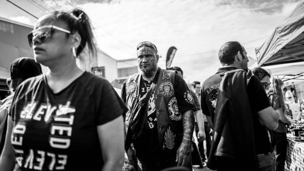 Tribal face tattooed man at Newtown festival 2021 monochrome