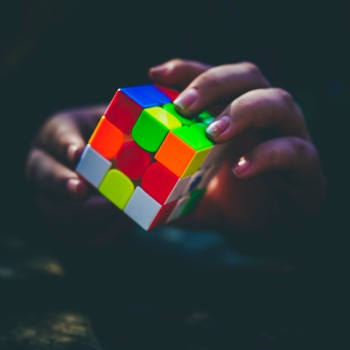 Hands holding a Rubik's cube