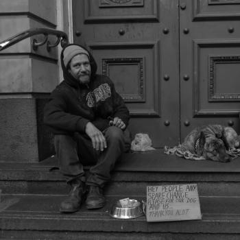 Homeless person with dog
