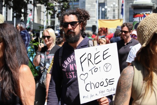 Guy with "free to choose" sign - Convoy 2022