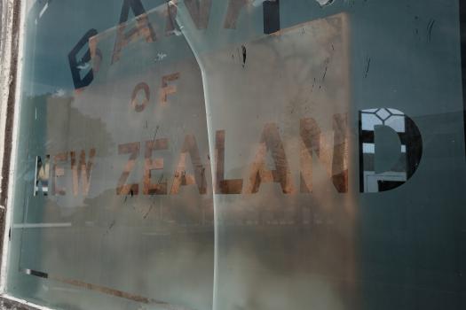 Bank of New Zealand sign on a frosted glass
