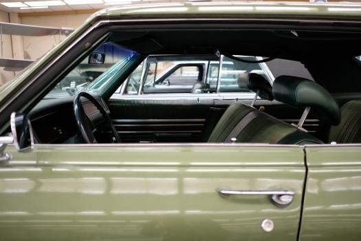 Left side interior view of green classic car