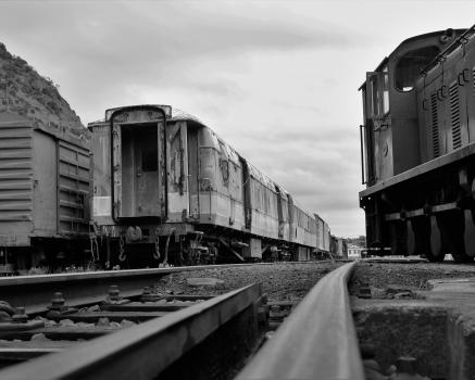 Abandoned old trains on tracks monochrome