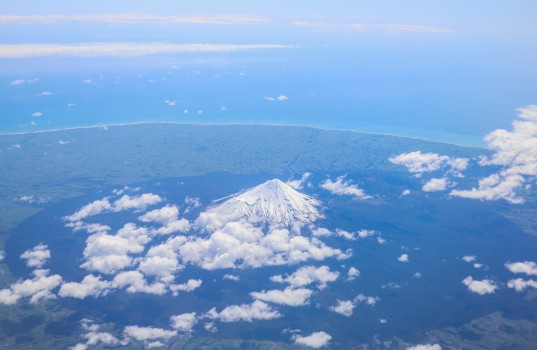 Aerial view of snow capped mount Taranaki