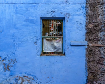 Blue wall with window grill