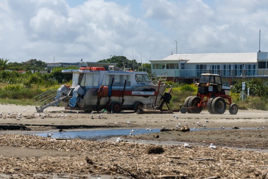 Kapiti boat and tractor on beach