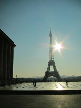 Shining sun and the Eiffel tower Paris