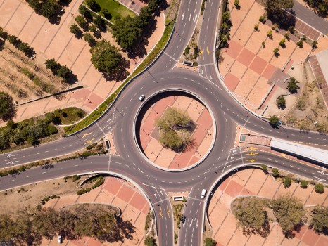 Aerial view over empty traffic intersection 
