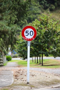 Circular '50 speed limit' sign board