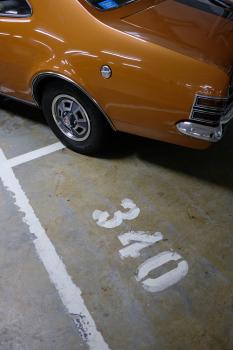 Classic orange Holden Monaro GTS rear fender and wheel