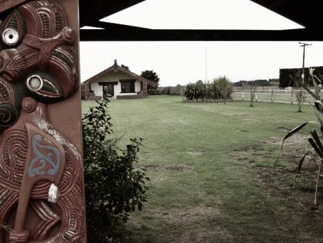 Maori carving Marae front yard and plantation