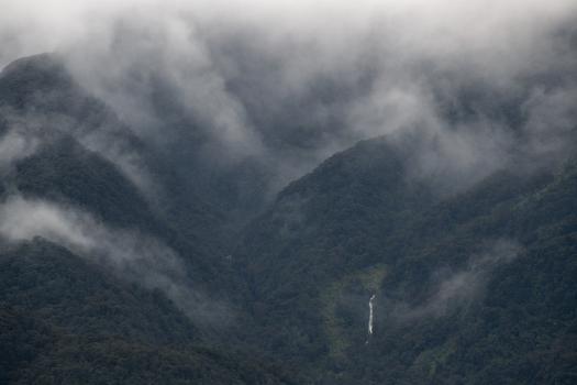 Waterfall in mist, Fiordland