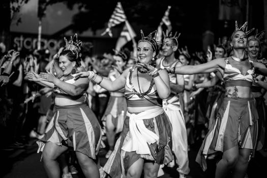 Group dancing in the street at Cuba Dupa 2021 bokeh black and white