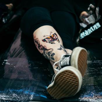 Butterfly tattoos on leg at Wellington tattoo convention 2021